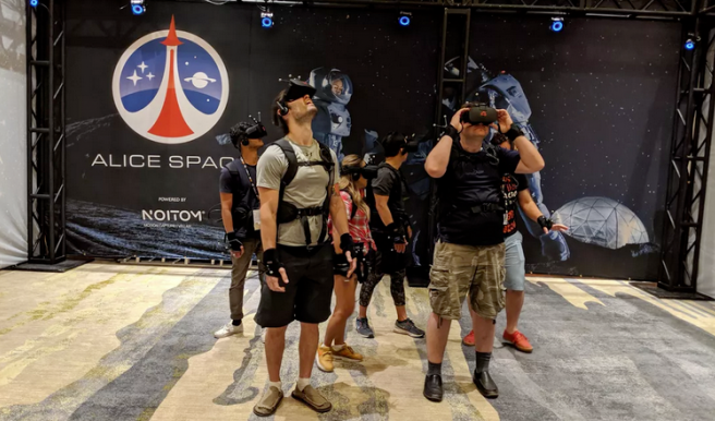 Visitors interact inside the Alice Space virtual reality experience by Noitom at SVVR 2017.