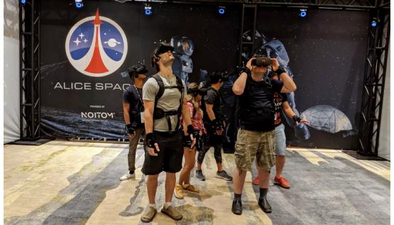 Visitors interact inside the Alice Space virtual reality experience by Noitom at SVVR 2017.
